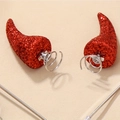 Détail de cornes de diable rouges scintillantes avec ressorts métalliques pour Halloween - Paire de pinces à ressort cornes de diable rouges à paillettes