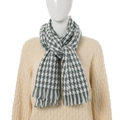 Houndstooth cashmere-like scarf in green and white with fringe on a model - Large Houndstooth Green