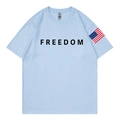 Light blue cotton T-shirt featuring FREEDOM print and US flag detail on the sleeve - S / Light Blue