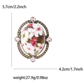 Spilla floreale barocca con smalto rosa e cristalli in cornice ovale di bronzo antico - Rosa 4669-PK