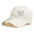 White baseball cap with rhinestone butterfly design shown from a side 45-degree angle - Beige