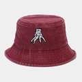 Detail of burgundy washed canvas bucket hat featuring white hand embroidery and metal eyelets - M (56-58cm) / Burgundy
