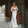 Elegant white off-shoulder mermaid satin wedding dress with lantern sleeves in vintage room - US 2 / White