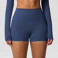 Detailed close-up of dark blue high-waisted yoga shorts with tummy control and lifting effect - 7101 Shorts - Badge Blue / S