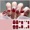 Detail of Christmas nail stickers with reindeer, heart, and snowflake embossed patterns - CS429
