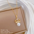 Detailed view of crown pendant with pearl and zircon inlay, measuring 1.4x2.8cm - Crown Pearl Necklace (D349) / Gold Necklace