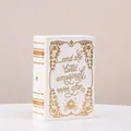 Moderne weiße Keramik Buchvase mit goldenem Märchenmuster und inspirierendem Spruch - Mittel / Goldbuch