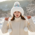 Winter plush earflap hat with deer antlers and colorful checkered pattern in white - Pocket Multi-Pom Style / White