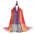 Close-up of bohemian pashmina scarf with colorful gradient paisley patterns and tassels - Paisley Red