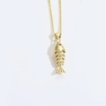 Gold fish pendant necklace with articulated body and sparkling red gemstone eye - Big Fish