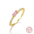 Macro shot of S925 sterling silver ring with pink rectangular gem and white cubic zirconia - Gold-Pink Zircon