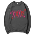 Dark grey crewneck sweatshirt featuring pink XOXO heart print on a white background - S / Tops / Dark Gray