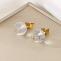 Macro shot of faceted crystal ball earrings with golden titanium steel studs on a tray - 10mm / Gold Base White Faceted Crystal (KE116392-K)