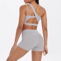 Two-piece grey yoga set with one-shoulder sports bra and high-waisted shorts - S / Frost Grey