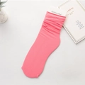Pink velvet ice silk slouch socks with vertical ribbed texture in flat lay photography - One Size / Watermelon red