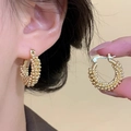 Vintage golden hoop earrings with textured bead detailing for a sophisticated look - Wavy Beaded Hoop