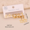 Golden stainless steel star earring set featuring hoop and stud designs on white card - 8# Star