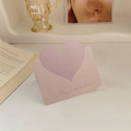Pink heart-shaped card with Best Wishes text on a cozy aesthetic desktop setup - Morandi Purple