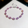 Detail of pink oval zircon bracelet with silver-tone adjustable chain and lobster clasp - Silver-Pink