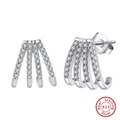 Macro shot of 925 sterling silver four-prong stud earrings with clear sparkling zircons - 925 Silver / White Gold Plated (Silver Color)