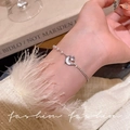 Elegant pearl and moon pendant bracelet with purple zircon inlay and silver finish - Heart Moon Zirconia Pearl Bracelet