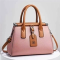 Elegant pink litchi grain women's handbag with brown handles and shoulder strap - 28x14x20cm / Pink
