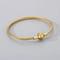 Bracciale in filo d'acciaio dorato intrecciato con ciondolo a portafortuna e segno Fu - Sacchetto di Soldi Carattere Fu - Tutto Oro