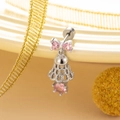 Bowknot bell stud earrings with pink heart crystal in titanium steel on beige tray - Silver Pink Style (Single Piece)