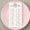 Set of 8 gold flower-shaped hollow metal paper clips on a decorative card display - Cherry Blossom / Set of 8