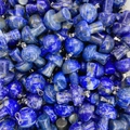 Stack of mushroom-shaped blue lapis lazuli crystal pendants with metal ring hooks - Lapis Lazuli