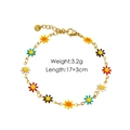 Detailed view of colorful daisy enamel charms and S.Steel logo on a gold chain bracelet - 4013 Bracelet Multicolor