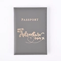 Grey PU leather passport holder with rose gold stamped adventure begins lettering - Gray