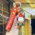 3D Santa Claus keychain with red silicone wristband and gift box detail for Christmas - Classic Santa Claus Face