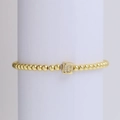 18k gold beaded bracelet featuring a sparkling cubic zircon letter C square charm - Letter C