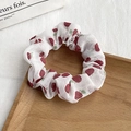 Detailed view of floral scrunchie with red cherry pattern on soft white chiffon fabric - 7# White Red Cherry Print