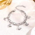 Double-layered stainless steel bracelet with butterfly charms and matte silver finish - Silver