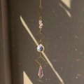 Golden suncatcher with raw amethyst crystals and prism ball casting rainbow spots - Amethyst Small Square Style