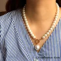 Collana di perle barocche con chiusura a ginocchiera dorata e ciondolo grande, 45cm - Chiusura OT Lunghezza 45cm