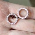 Silver halo stud earrings featuring a round pink gemstone with micro zircon paving - Pink