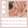 Macro detail of French style press-on nails with nude pink base, white tips and rhinestones - Z340 Hollow Stacked Diamond (Glue Style)
