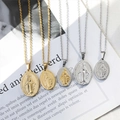 Ovale Wonderdadige Medaille hanger kettingen in goud en zilver op een tekst achtergrond - 2*3cm (Enkele Hanger) / Goud & Zilver