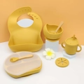 9-piece yellow silicone baby feeding set with suction plate, bowl, bib and straw cup - Mango Yellow