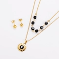 Parure de bijoux dorés avec collier et boucles d'oreilles à motif œil maléfique et perles - Noir Doré