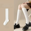 White vertical ribbed knee-high socks for women with casual學院 style cotton texture - One Size / Striped Calf Socks - White
