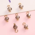 Brown faceted 4mm glass crystal charms with gold hanging loops for DIY jewelry - Grey Bicone Bead