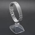 Macro view of 1cm wide stainless steel men's bracelet with engravable metal plate - 21cm / Silver Curved Bar Style