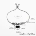 Adjustable stainless steel snake chain bracelet with black enamel heart charm and zircons - Steel