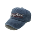 Close-up of white New York embroidery on washed blue vintage cotton baseball cap - M(56-58cm) / Navy Blue