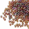 Macro detail of iridescent 2mm glass seed beads for DIY jewelry and tassels - Iridescent Tan 162C