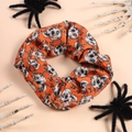 Detalle de coletero naranja para Halloween con estampados de calaveras y murciélagos - Estilo Halloween 3 (Calavera Naranja)